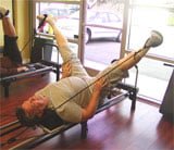 Female Chiropractor Irvine CA Tim Olearts Stretching